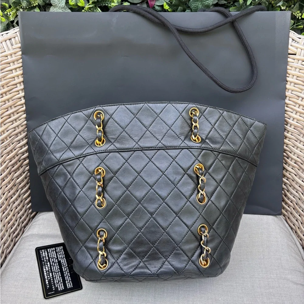 Authentic CHANEL RARE black lambskin quilted double pocket CC chain bucket bag